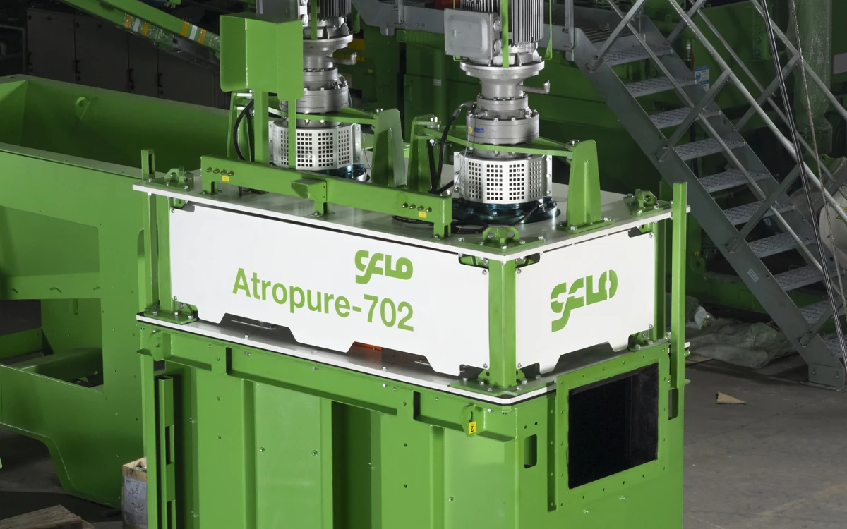 An Atropure 702 attrition scrubber in the works, its white nameplate panel across the two-cell tank and the two vertically mounted drive motors and gearboxes standing above it