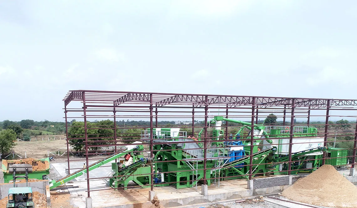 A green CFlo plant being installed inside a new red steel-framed building