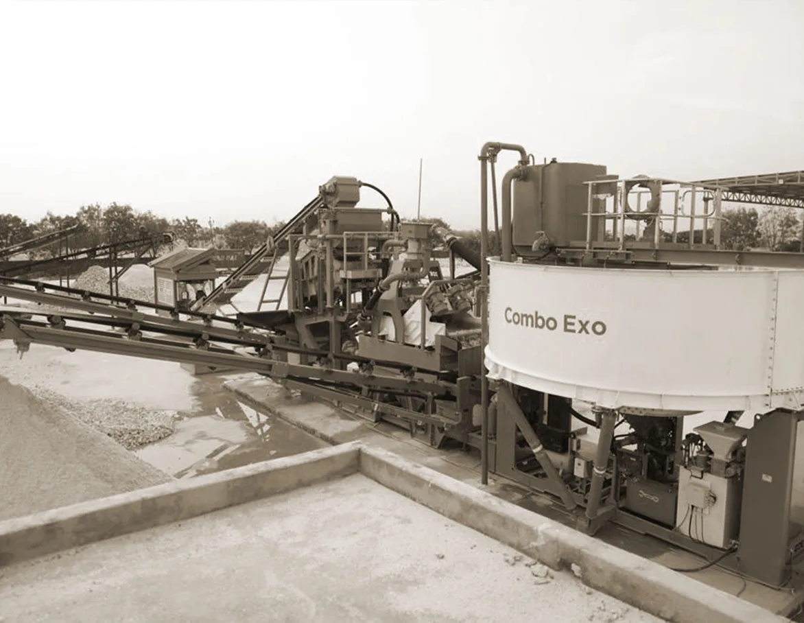 A CFlo Micrograder Exo plant with its circular tank, conveyors and walkways on a concrete pad