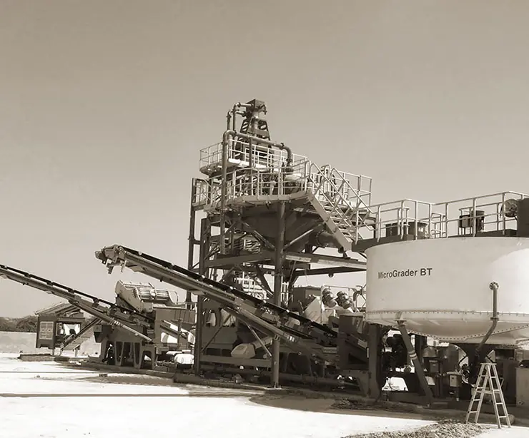 A CFlo Micrograder BT50 with its access stairs and conveyors on a prepared site