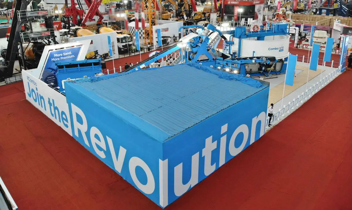 A blue CFlo exhibition stand at EXCON 2019 carrying the words join the revolution